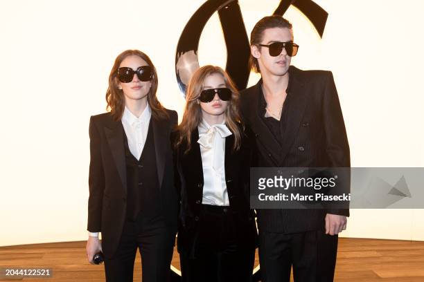 Talia Ryder, Mimi Ryder and Earl Cave attend the Saint Laurent Womenswear Fall/Winter 2024-2025 show as part of Paris Fashion Week on February 27,...