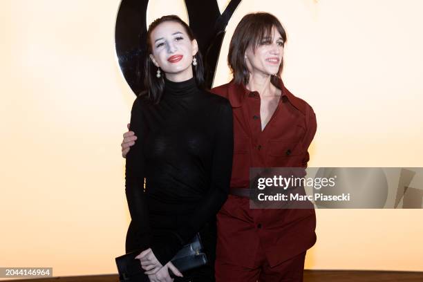 Alice Attal and Charlotte Gainsbourg attend the Saint Laurent Womenswear Fall/Winter 2024-2025 show as part of Paris Fashion Week on February 27,...