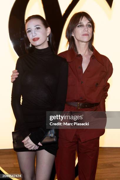 Alice Attal and Charlotte Gainsbourg attend the Saint Laurent Womenswear Fall/Winter 2024-2025 show as part of Paris Fashion Week on February 27,...