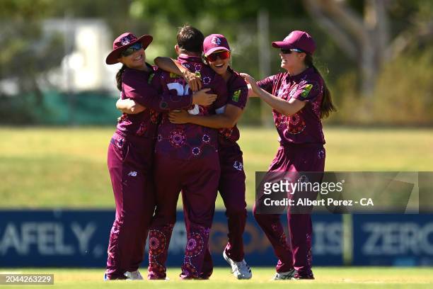 Tracee Williamson of Queensland celebrates dismissing Roxsanne Van-Veen of New South Wales during the 2024 National Indigenous Cricket Championships...