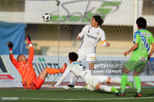 Daichi Tagami of V-Varen Nagasaki dives to score the team's first goal during the J.League J1 match between Shonan Bellmare and V-Varen Nagasaki at...