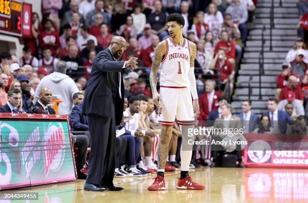 Mike Woodson the head coach of the Indiana Hoosiers gives instructions to Kel'el Ware in the first half against the Wisconsin Badgers at Simon Skjodt...