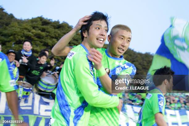 Toshiki Ishikawa of Shonan Bellmare celebrates with teammate Kaoru Takayama after scoring the team's second goal during the J.League J1 match between...