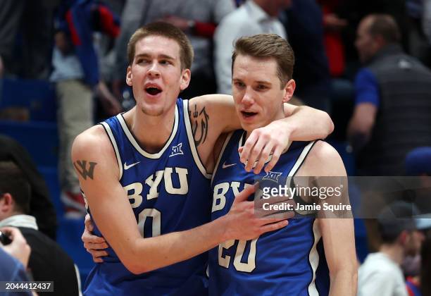 Noah Waterman and Spencer Johnson of the Brigham Young Cougars celebrate after BYU defeated the Kansas Jayhawks 76-68 to win the game at Allen...