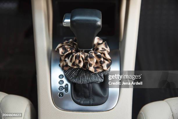 leopard print 90s hair scrunchies, automatic car gear selector, car gear shift lever - automatic gearshift stock pictures, royalty-free photos & images