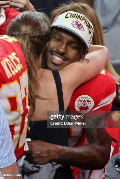 Taylor Swift hugs wide receiver Mecole Hardman Jr. #12 of the Kansas City Chiefs after the Chiefs' 25-22 overtime victory over the San Francisco...