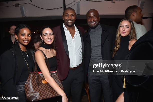 Metta Sandiford-Artest , Akbar Gbajabiamila and guests attend Daymond John's Rise Nation Mastermind Welcome Party at Harriet's Rooftop on February...