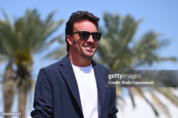 Fernando Alonso of Spain and Aston Martin F1 Team walks in the Paddock during previews ahead of the F1 Grand Prix of Bahrain at Bahrain International...