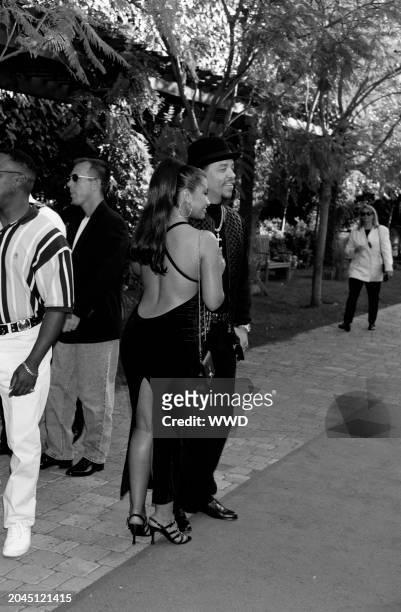 Rapper Ice-T and Darlene Ortiz attend the 1995 MTV Movie Awards on June 10 at Warner Brothers Studios in Burbank, California.
