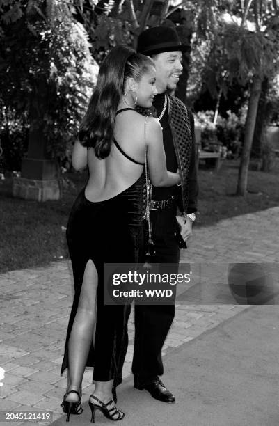 Rapper Ice-T and Darlene Ortiz attend the 1995 MTV Movie Awards on June 10 at Warner Brothers Studios in Burbank, California.