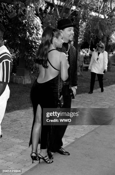 Rapper Ice-T and Darlene Ortiz attend the 1995 MTV Movie Awards on June 10 at Warner Brothers Studios in Burbank, California.