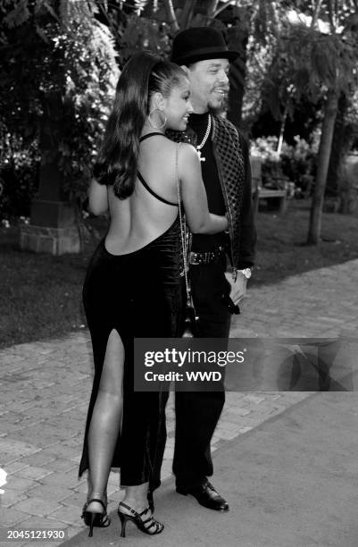 Rapper Ice-T and Darlene Ortiz attend the 1995 MTV Movie Awards on June 10 at Warner Brothers Studios in Burbank, California.