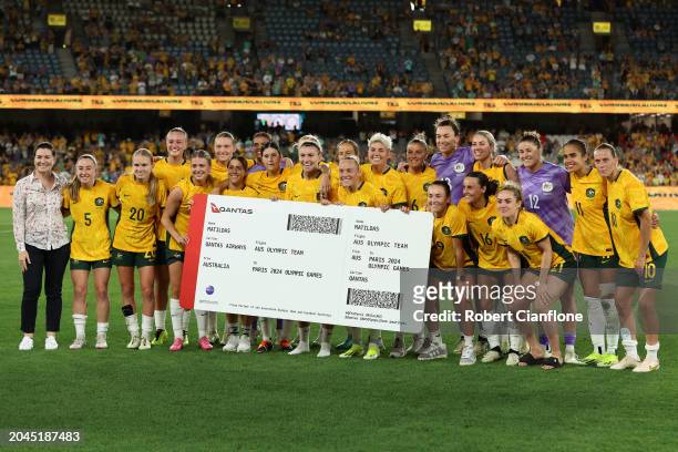 Australian Olympic Team Chef de Mission Anna Meares poses with the Matildas after securing their qualification for the Paris 2024 Olympics after...