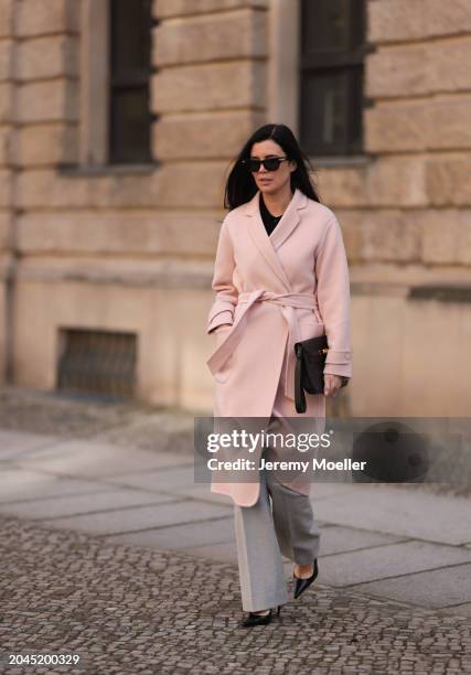 Leo Eberlin seen wearing Bottega Veneta black sunglasses, Leo Mathild diamond jewelry, Allude x Leo Mathild cashmere wool knit buttoned body, Sezane...