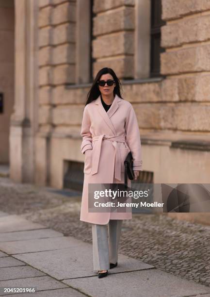 Leo Eberlin seen wearing Bottega Veneta black sunglasses, Leo Mathild diamond jewelry, Allude x Leo Mathild cashmere wool knit buttoned body, Sezane...