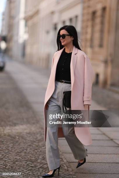 Leo Eberlin seen wearing Bottega Veneta black sunglasses, Allude x Leo Mathild cashmere wool knit buttoned body, Sezane light pink elegant wool coat,...