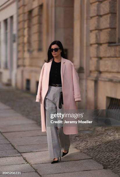 Leo Eberlin seen wearing Bottega Veneta black sunglasses, Allude x Leo Mathild cashmere wool knit buttoned body, Sezane light pink elegant wool coat,...