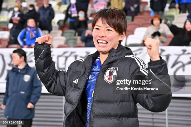 Saki Kumagai of Japan poses as the team celebrates the qualification for the Paris Olympics following the 2-1 victory in the Women's Football Paris...