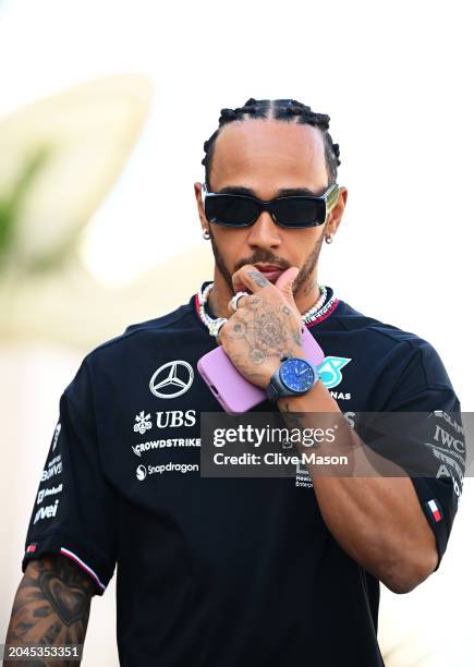 Lewis Hamilton of Great Britain and Mercedes walks in the Paddock during previews ahead of the F1 Grand Prix of Bahrain at Bahrain International...