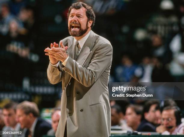 Carlesimo, Head Coach for the Portland Trail Blazers shouts out instructions to his players during the NBA Midwest Division basketball game against...