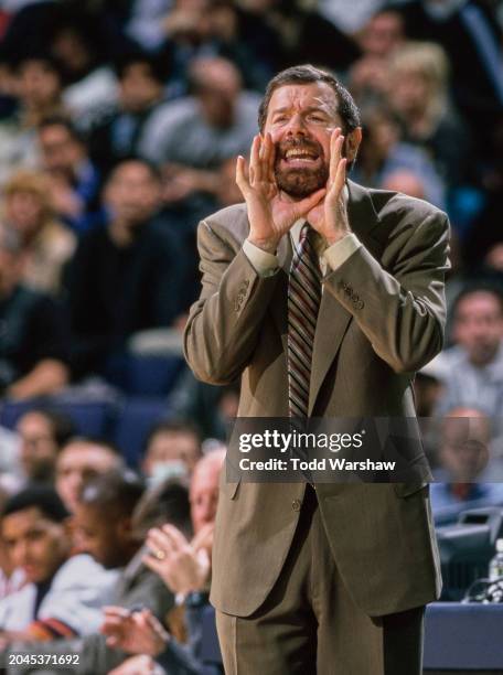 Carlesimo, Head Coach for the Golden State Warriors shouts out instructions to his players during the NBA Pacific Division basketball game against...