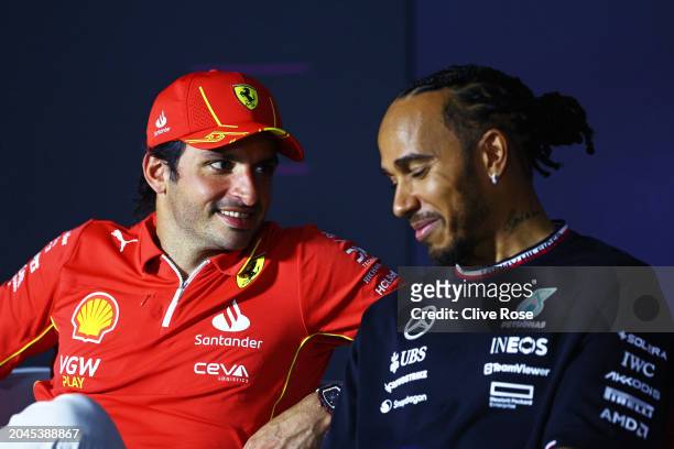 Carlos Sainz of Spain and Ferrari and Lewis Hamilton of Great Britain and Mercedes attend the Drivers Press Conference during previews ahead of the...