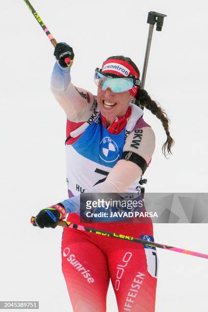 Switzerland's Lena Haecki-Gross celebrates winning the women's 12,5 km mass start event of the Biathlon World Cup in Holmenkollen, Oslo on March 2,...