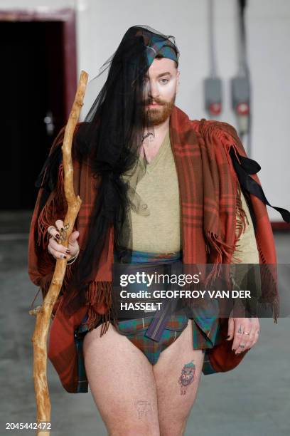English singer Sam Smith presents a creation by Vivienne Westwood for the Women Ready-to-wear Fall-Winter 2024/2025 collection as part of the Paris...