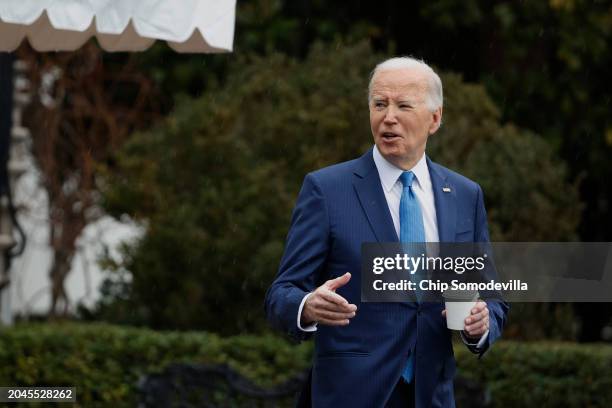 President Joe Biden walks across the South Lawn before boarding the Marine One presidential helicopter to depart the White House on February 28, 2024...