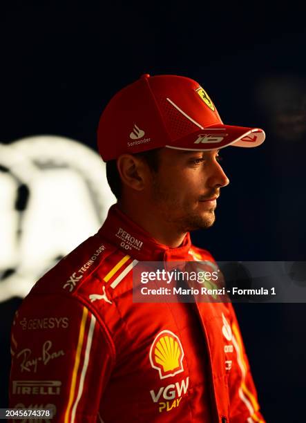 Charles Leclerc of Monaco and Ferrari looks on in the Paddock during previews ahead of the F1 Grand Prix of Bahrain at Bahrain International Circuit...