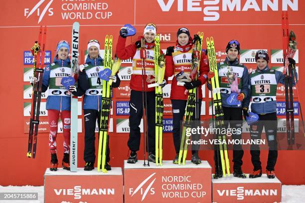 Second-placed Austria's Stefan Rettenegger and Johannes Lamparter, winners Norway's Joergen Graabak and Jens Luraas Oftebro and third-placed...