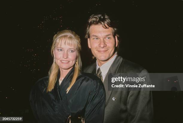 American dancer, choreographer and actress Lisa Niemi, wearing a black coat, with her husband, American actor, singer and dancer Patrick Swayze, who...