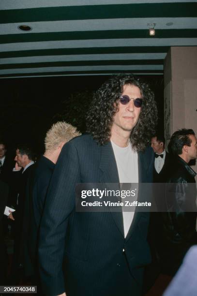 American singer Rozonda 'Chilli' Thomas, wearing a dark pinstripe suit over a white t-shirt and sunglasses, attends Arista Records Pre-Grammys Party...