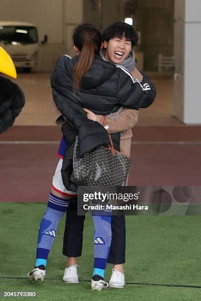 Azusa Iwashimizu and Yui Hasegawa of Japan hug after the Women's Football Paris Olympic Asian Final Qualifier second leg between Japan and North...