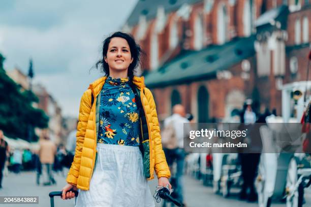 solo traveler - puffer jacket stock pictures, royalty-free photos & images