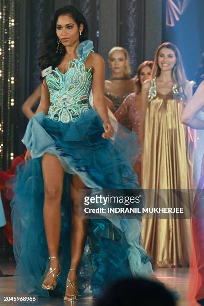 France's Clémence Botino walks the ramp during the Best Designer Award contest of the 71st Miss World in Mumbai on March 2 for their 71st Miss World...