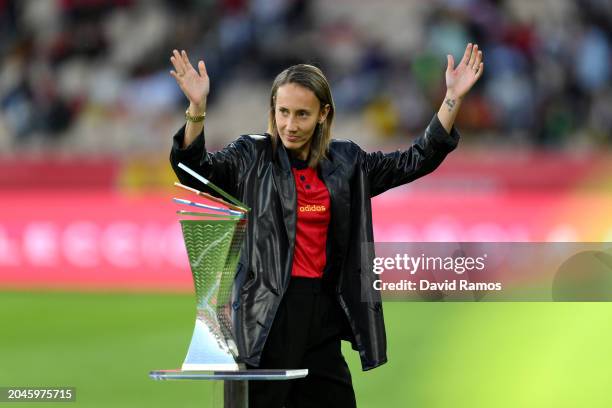 Spanish Footballer Virginia Torrecilla acknowledges the fans after she presents the UEFA Women's Nations League trophy prior to the UEFA Women's...