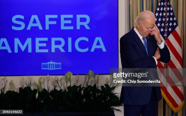 President Joe Biden listens to his introduction before speaking to police chiefs from across the country and members of his administration in the...