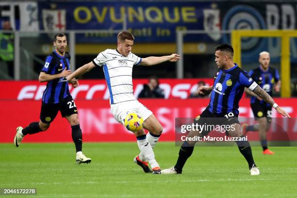 Mario Pasalic of Atalanta BC is challenged by Lautaro Martinez of FC Internazionale during the Serie A TIM match between FC Internazionale and...