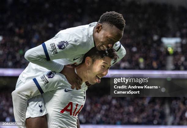 Tottenham Hotspur's Son Heung-Min celebrates scoring his side's third goal with team mate Pape Matar Sarr during the Premier League match between...