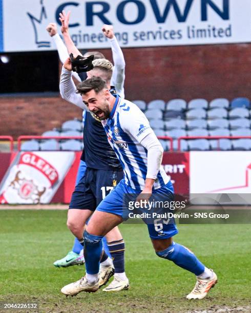 Kilmarnock's Robbie Deas takes off his mask to celebrate scoring to make it 2-2 during a cinch Premiership match between Dundee and Kilmarnock at the...