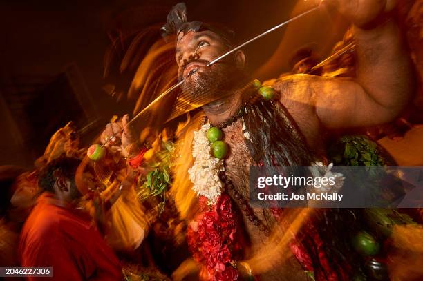 Man doing a ritualistic dance in Kuala Lumpur, Malaysia, in February 2010, during Thaipusam, a major religious festival celebrated by the Hindu Tamil...