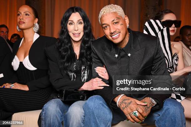 Singer Cher and Alexander Edwards attend the Balmain Womenswear Fall/Winter 2024-2025 show as part of Paris Fashion Week on February 28, 2024 in...