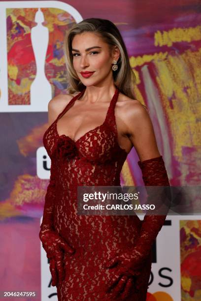 British television personality Zara McDermott poses on the red carpet upon arrival for the BRIT Awards 2024 in London on March 2, 2024. / RESTRICTED...