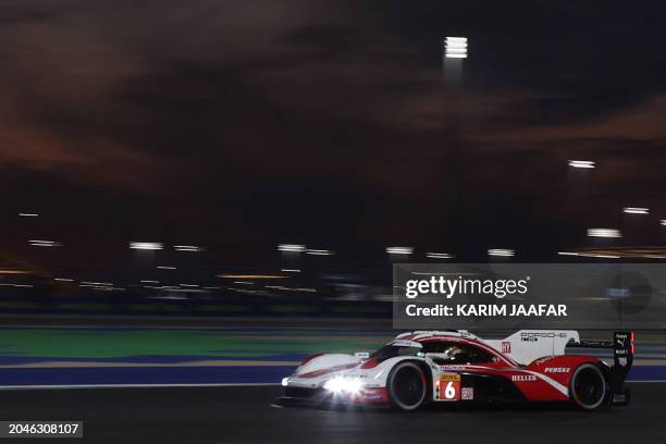 The Porsche Penske Motorsport, Porsche 963 of Kevin Estre, Andre Lotterer, and Laurens Vanthoor takes part in the final day of racing action in the...