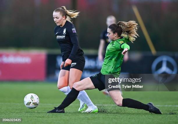 Westmeath , Ireland - 2 March 2024; Kerryanne Brown of Athlone Town is tackled by Lauryn O'Callaghan of Peamount United during the 2024 Women's...