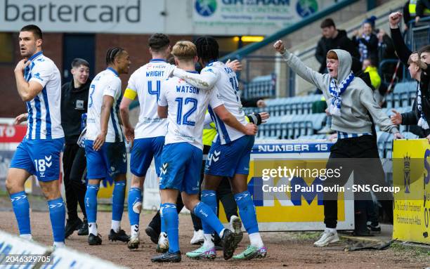 Kilmarnock players celebrate with fans after Robbie Deas scores to make it 2-2 during a cinch Premiership match between Dundee and Kilmarnock at the...