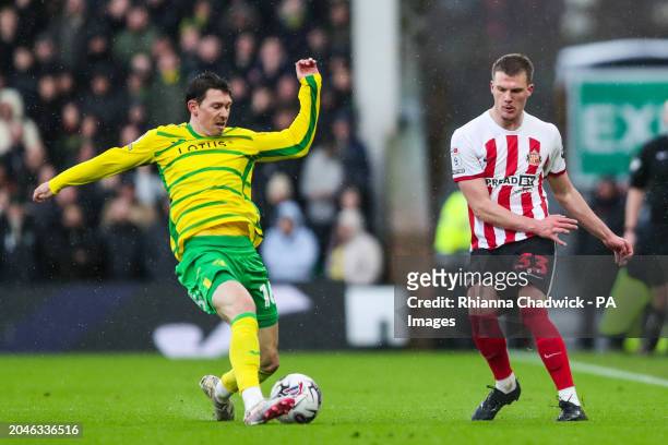 Norwich City's Christian Fassnacht battles for the ball against Sunderland's Leo Fuhr Hjelde during the Sky Bet Championship match at Carrow Road,...