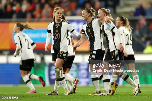 Lea Schueller of Germany celebrates scoring her team's second goal with teammates Sjoeke Nuesken and Alexandra Popp during the UEFA Women's Nations...