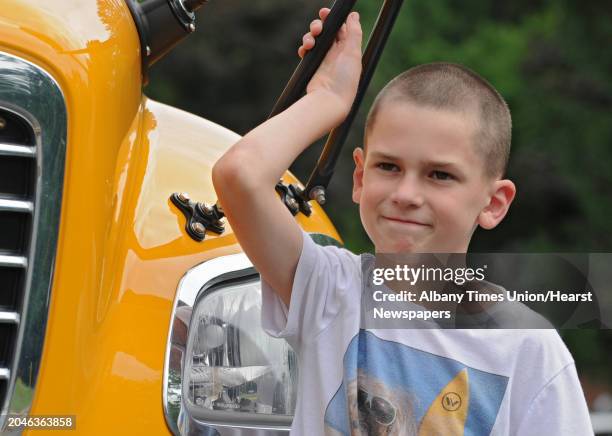 Second grader Logan Trembley raised $500 for the Duanesburg Rescue Squad damaged by a tornado by holding a bake sale at Raiderfest and doing a hats...